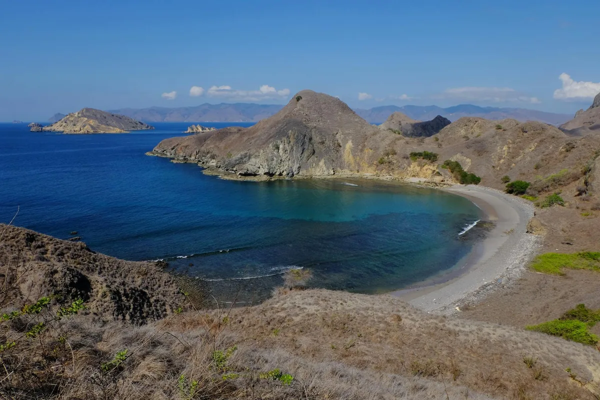 Padar Island three-bay viewpoint from the summit ridge, Komodo National Park Indonesia